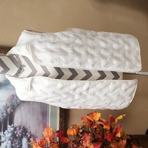 Tangerine White Quilted Vest for Versatile Layering. It's lightweight